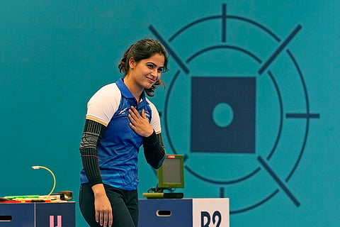 Manu Bhaker celebrates after winning the bronze medal 